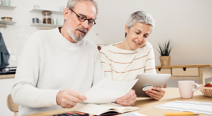 A couple reviewing documents for their taxes.